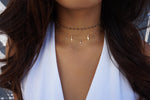 7-gem choker layered with several other chokers from Au Courant
